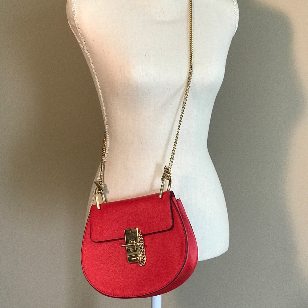 Red turnlock crossbody with chain strap